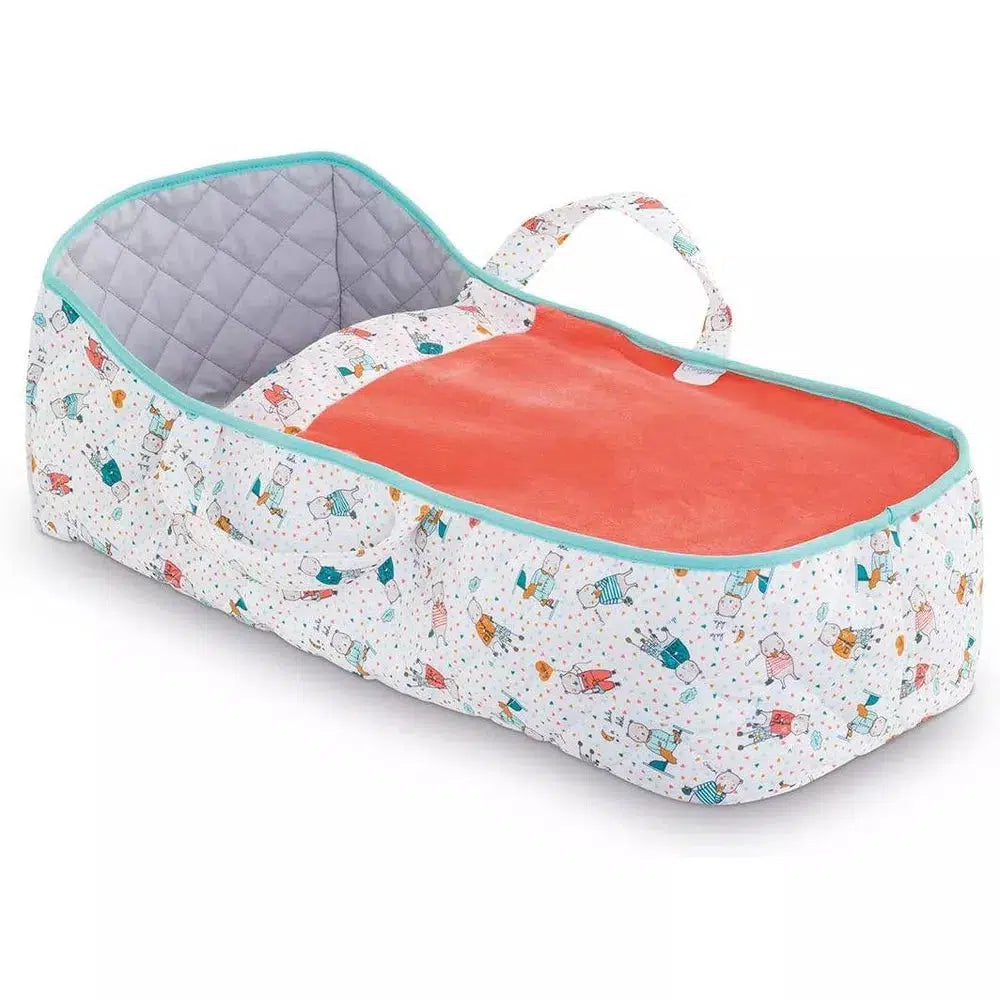 The carry bed is a rectangular bed with walls and carry straps on each side for children to carry the bed with. The outside of the bed is white with bear characters printed all over it and a coral blue trim on the top edge. The inside is grey with a diamond pattern sewn in. The top of the bed has a built in blanket that is a light red color.