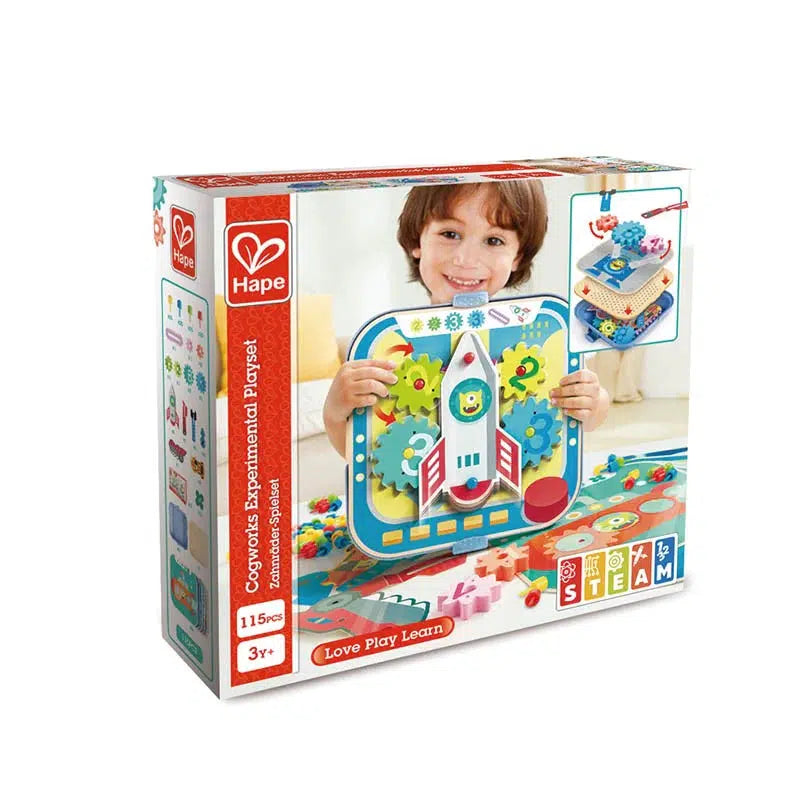 Toy in box | Front of box has a picture of a young boy holding the toy with other toy parts scattered on the floor in front of him. | Another smaller image on the front shows the mechanisms of how the toy functions.