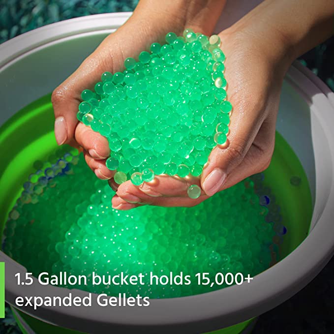 1.5 gallon bucket that holds 15000+ expanded gellets | hands are scooping gellets out of bucket.