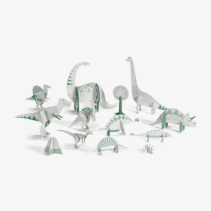 an array of the dinosaurs from the book are spread out fully put together and standing on their own. There are also a couple other things such as some grass and a tree, all of the items are yet to be colored in.