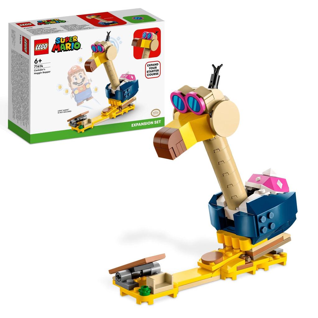 The set is shown in front of its box | There is a conkdor (a condor with a long neck and a koopa shell on its back) sitting on a plank with a platform for characters to land where it can bop them with its beak