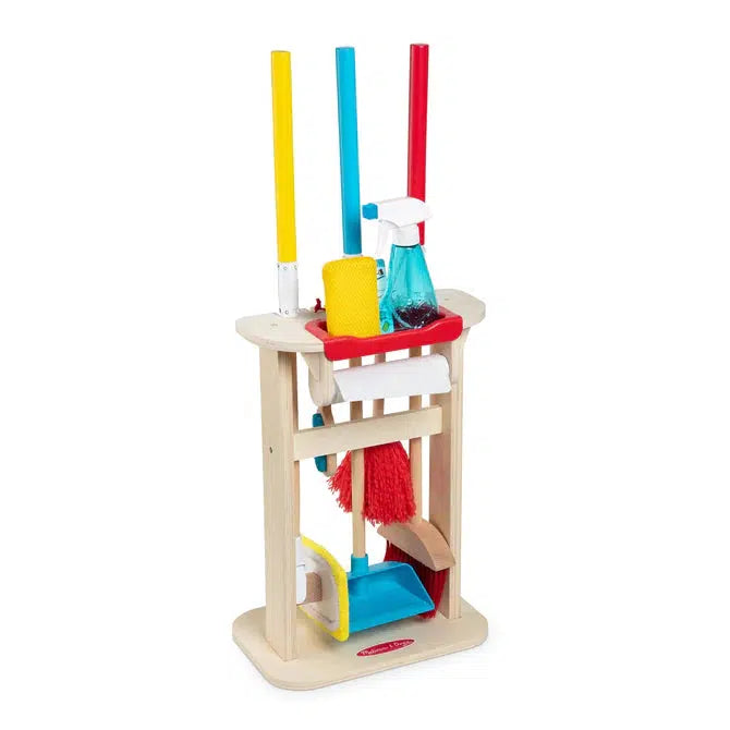 Image of the fully put together play set. The set's main colors are red, yellow, and blue. It is a wooden stand that can store all sorts of different types of cleaning materials. It can hold brooms, mops, spray bottles, rags, sponges, paper towels, dusters, and dust pans.