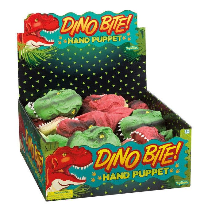 A display box filled with t-rex head puppets in both red and green. The puppets themselves are detailed to look realistic with colors and textures that come right from a history book.