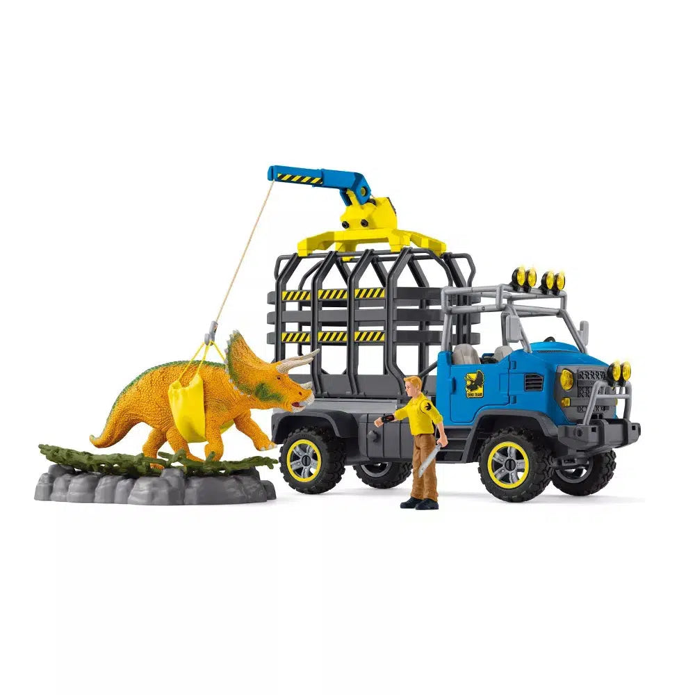 Image of all the included pieces of the set outside of the packaging. It comes with a transport truck complete with claw, a dinosaur trap, an orange dinosaur, and a ranger.