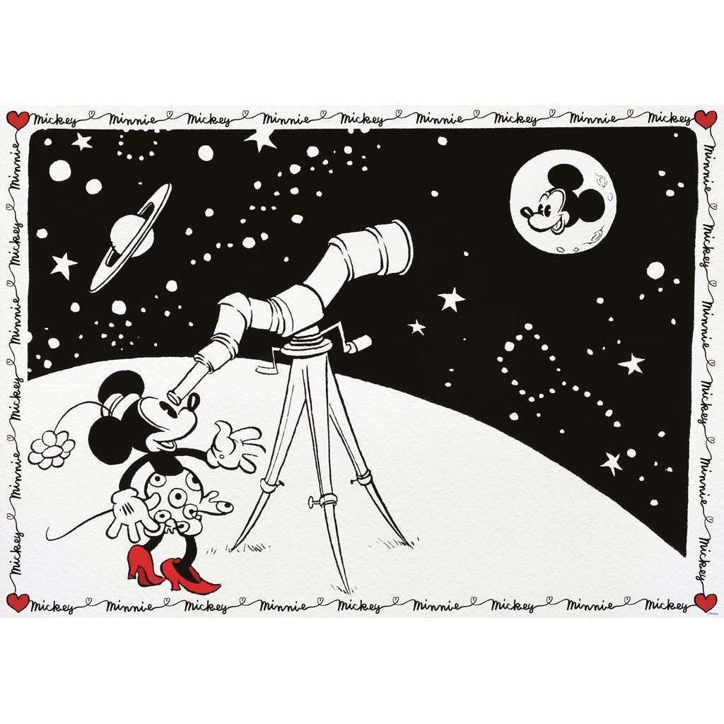 Image of puzzle | Vintage Minnie stands looking through a telescope at Mickey's head the moon | The border of the puzzle has a red hearts and cursive font saying mickey minnie repeated