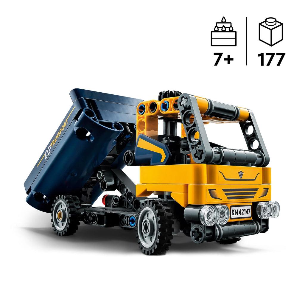 The dump truck is shown with it's bed raised to dump out contents | piece count of 177 and age of 7+ in top right corner
