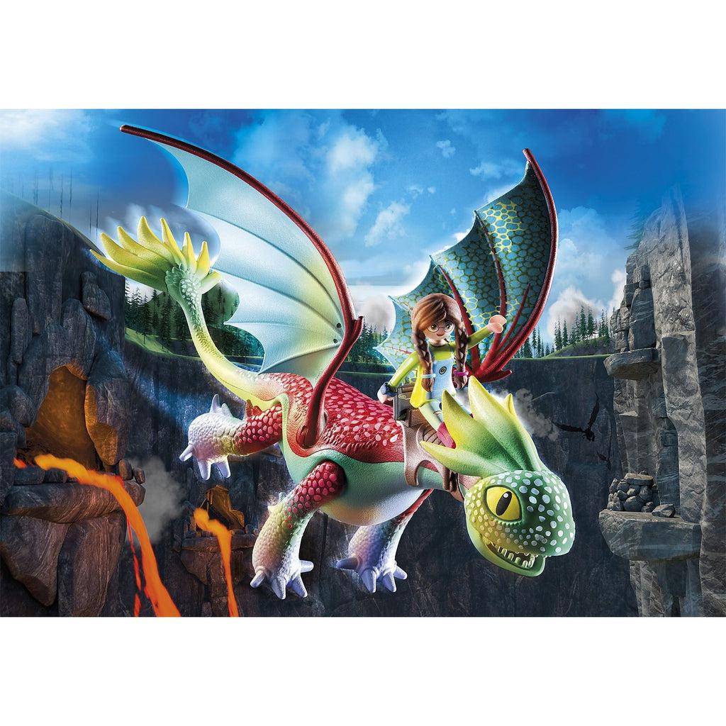 The same image from the box is shown. The alex figure is sitting in a saddle attached to the dragons neck. The dragon has yellow tipped green frills at the end of it's long tail and coming out of the back of it's head