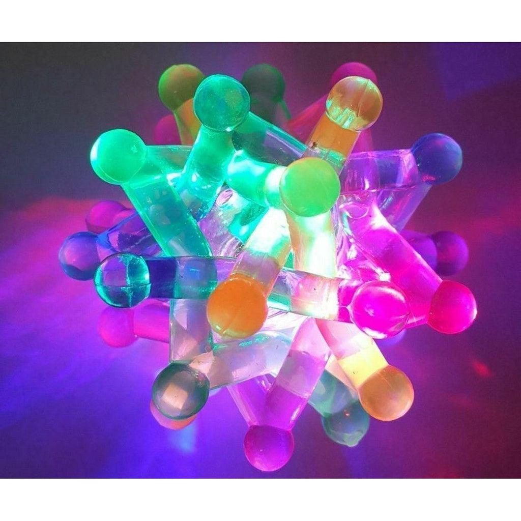 Close up of the Neutron Ball with the light on the inside. Because of the translucent star-shaped multicolored rubber tubes, it shines all different colors.