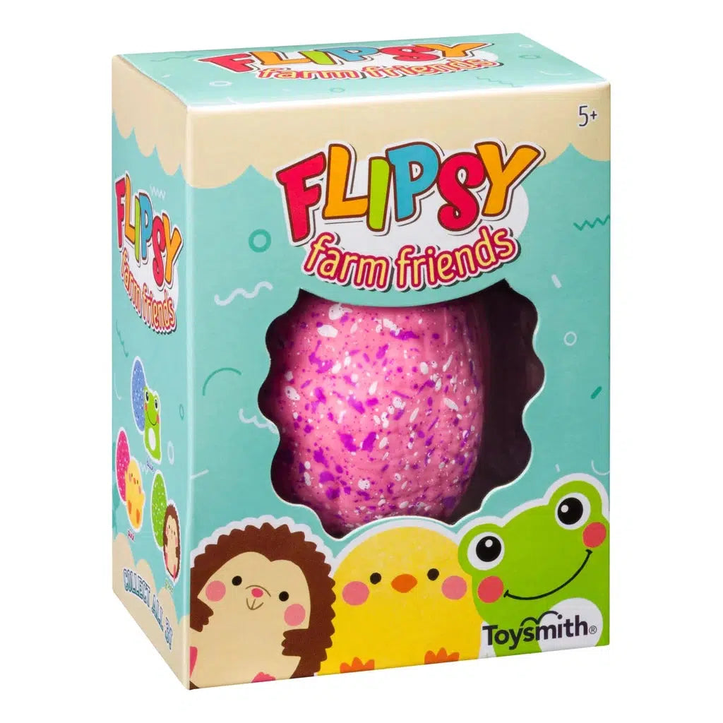 Box reads: Flipsy Farm friends. There is a graphic of a hedgehog, chick, and frog lined up together at the bottom of the front. The center of the box has a cutout revealing a pink speckled egg. The bottom right of the box has the toysmith logo and the top right says: 5+