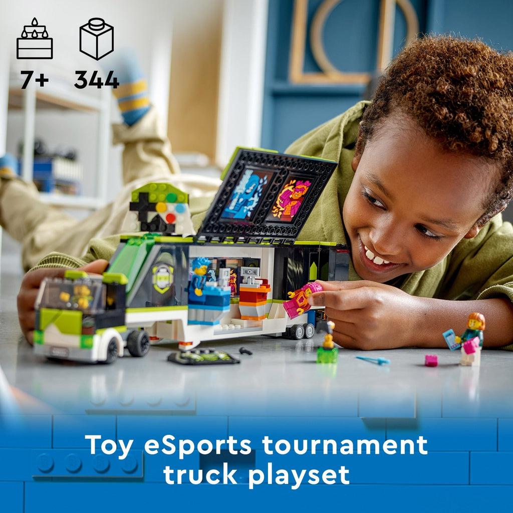 a kid is shown playing with the lego set | piece count of 344 and age of 7+ in top left | image reads: toy eSports tournament truck playset.