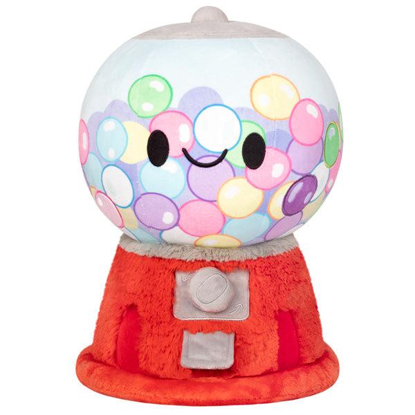 Image of the Gumball Machine squishable. It is a red gumball machine with pastel colored gumballs.