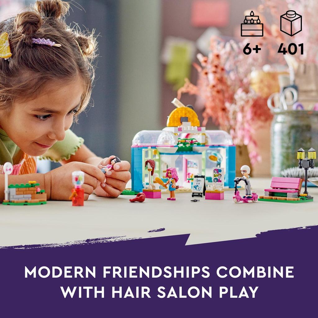A girl is shows playing with the set | Piece count of 401 and age recommendation of 6+ in top right | Image reads: Modern friendships combine with hair salon play.