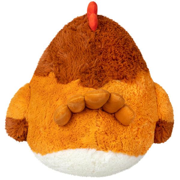 Back view of the plush. Shows that the tail has 5 different parts.