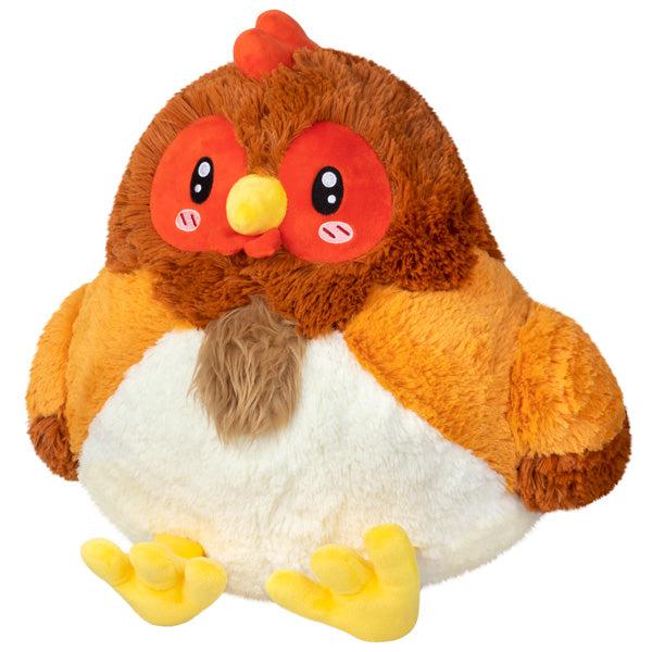 Image of the Hen squishable. It is an orange, brown, and white chicken with a tan beard.