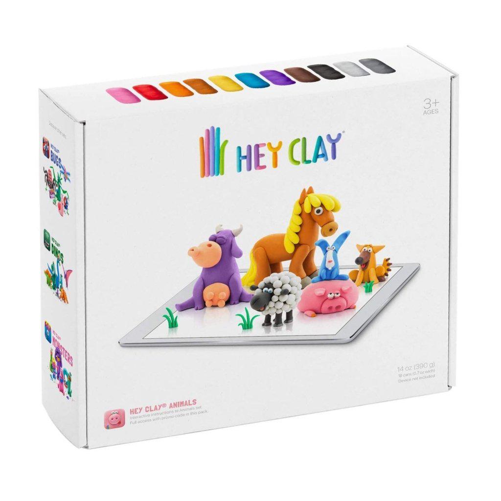 this image shows farm animals made out of clay, with the words HEY CLAY written on the box in rainbow colors. the clay colors are inside the box to create fun creations
