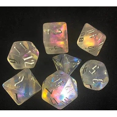 all 7 dice are shown. They are a clear resin with yellow, purple, blue, and pink glittery resin swirled inside them.