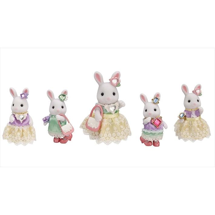 Shows different configurations of the accessories on the rabbit doll.