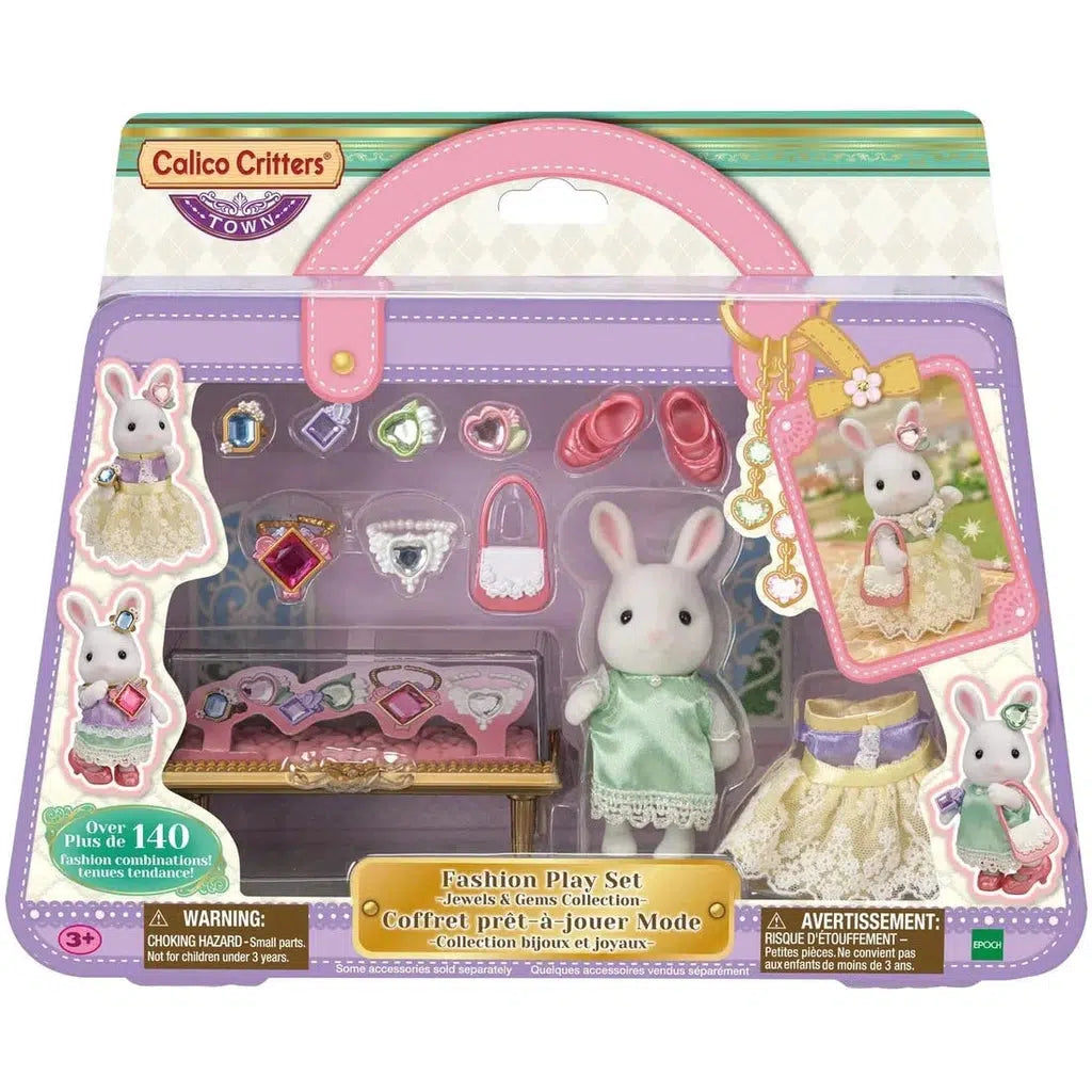 Image of the packaging for the Calico Critters Jewels & Gems Collection. The front is made from clear plastic so that you can see the rabbit doll and included accessories.
