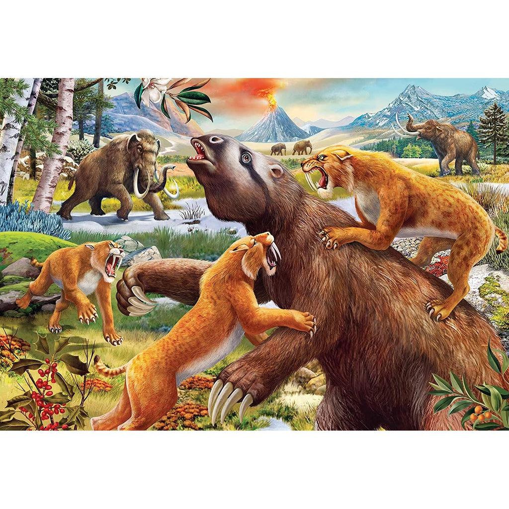Image on puzzle 2 | 3 saber tooth tigers attack a large sloth like creature. Behind them a forest/mountain scene with an exploding volcano and wooly mammoths.