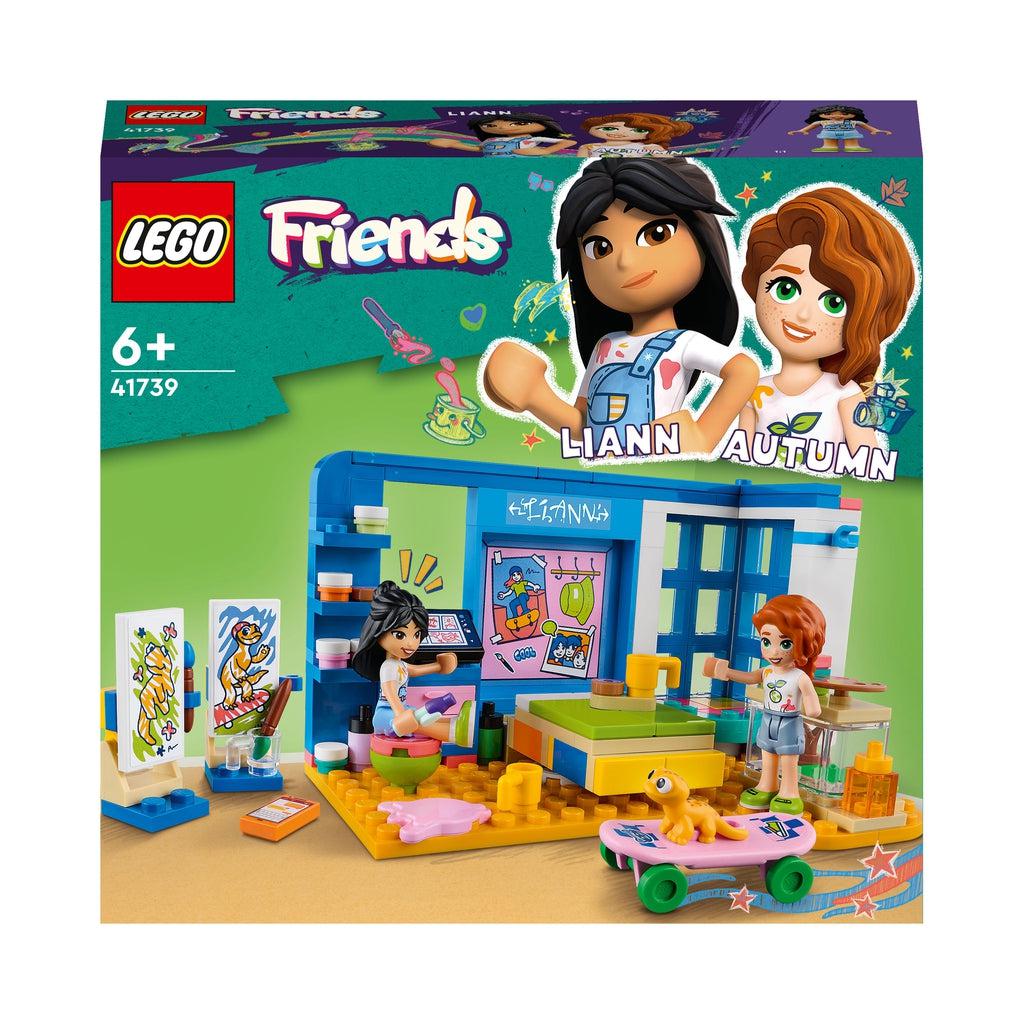 The front of the box shows the two lego friends characters, liann and autumn, in a lego room themed around art