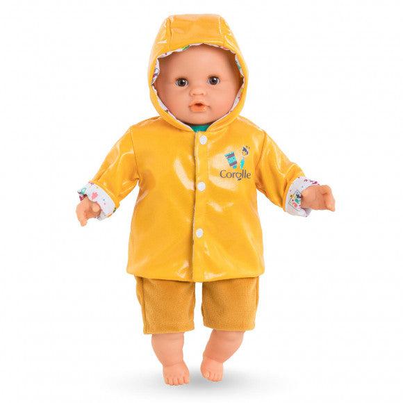 A doll is shown wearing the raincoat with the yellow side showing.