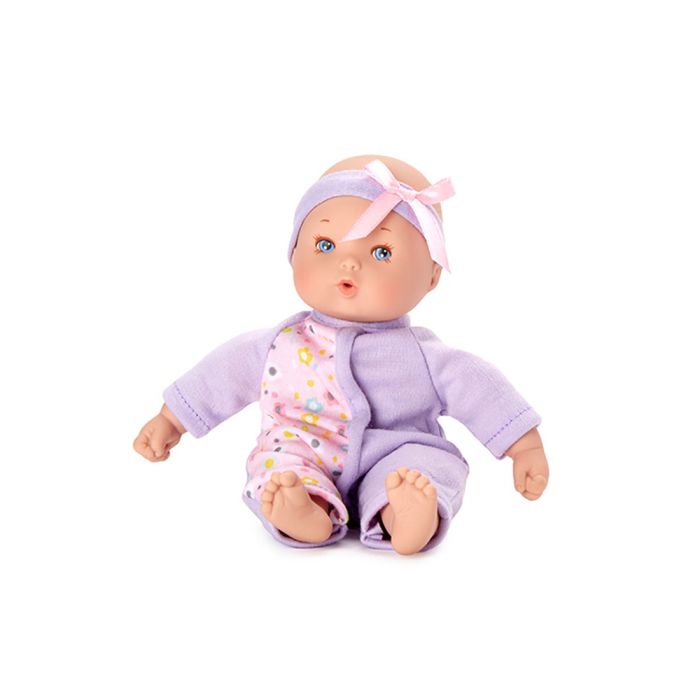 Doll with light skin tone. | Doll is wearing a pink and purple bow and lavender onesie with a flower printed pink front panel.