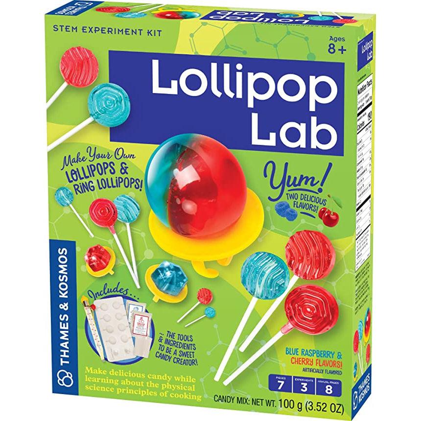 Toy packaging | Front of box has images of red and blue lollipops and a red/blue split ring sucker. | Small image in bottom left shows contents of kit.