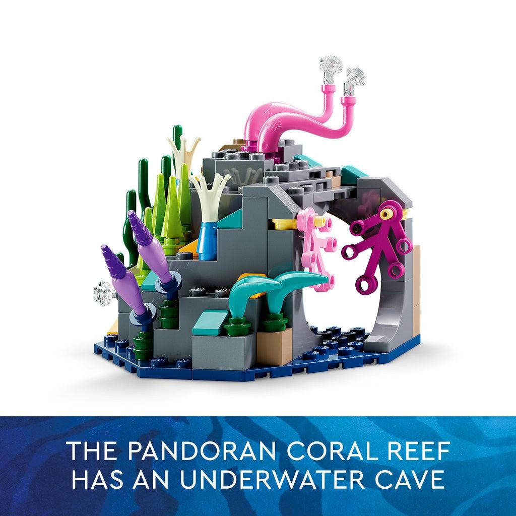 Image shows one of the lego rock structures, it has lego coral covering it and has a hollow opening through part of it. | Image reads: The pandoran coral reef has an underwater cave