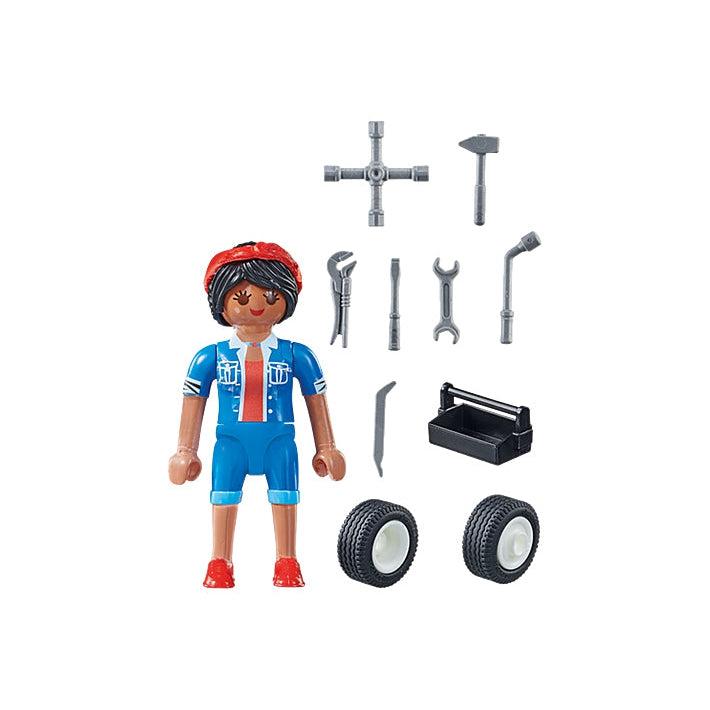 The figure, the 7 tools, the toolbox, and the two tires are shown
