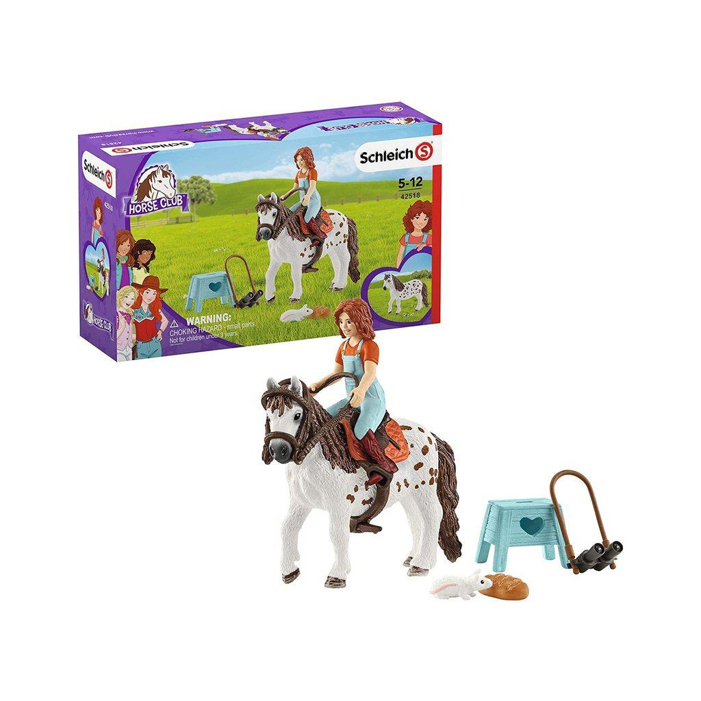 Image of the packaging for the Mia and Spotty play set. On the front is a picture of all the included pieces.