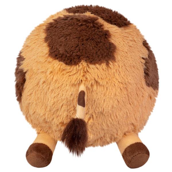 Back view of the plush. Shows that it has a tail coming out of the back and four legs that stick out.