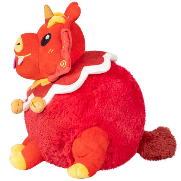 Side view of the plush. Shows that except for the head, the plush is a sphere.