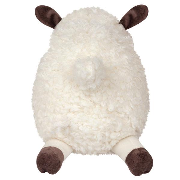 Back view of the plush. Shows that it has a small fluffy white tail.