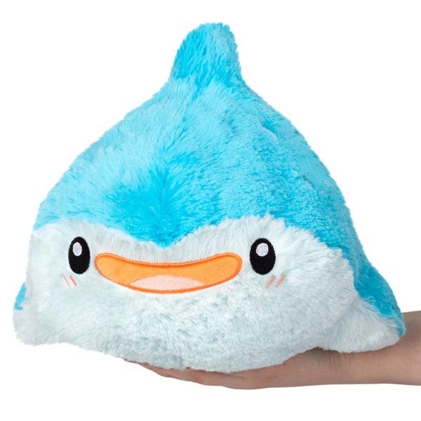 Image of the Mini Whale Shark squishable. It is a cute bright blue shark plush with a wide, happy, orange mouth.