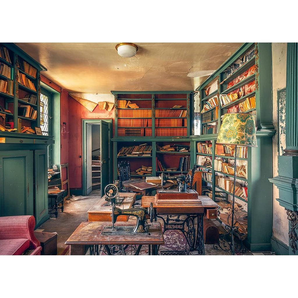 Puzzle image | Sunlight streams into a cramped, abandoned room | Shelves full of tattered books line the walls and wallpaper tears away from bare walls | Antique sewing machines and furniture fill the space.
