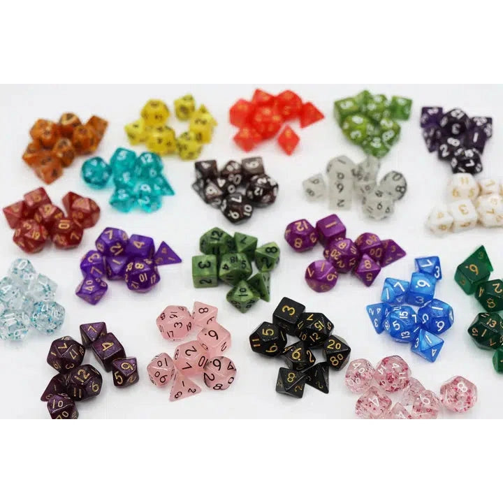 A handful of the different colors of dice set are shown. Colors include light pink, various purples, greens, and blues, some clear ones with colored flecks inside, and more.