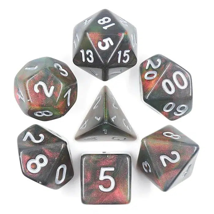 The 7 dice are in a circle with the D4 in the center, each dice is made of gray resin with sparkly amber and green mixed in to make them look like space filled with stars and galaxies