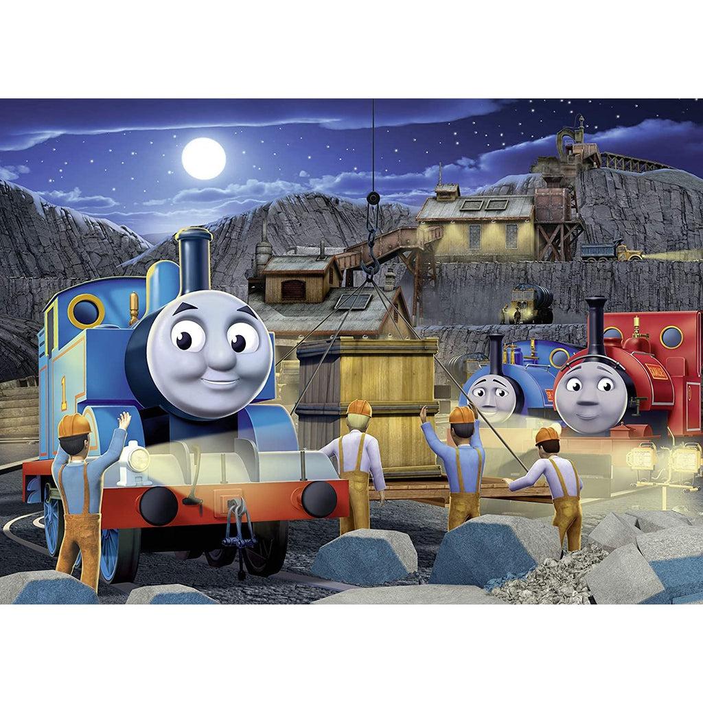 Image of the finished puzzle. It is a picture of Thomas the Train and two of his friends in a quary at night.