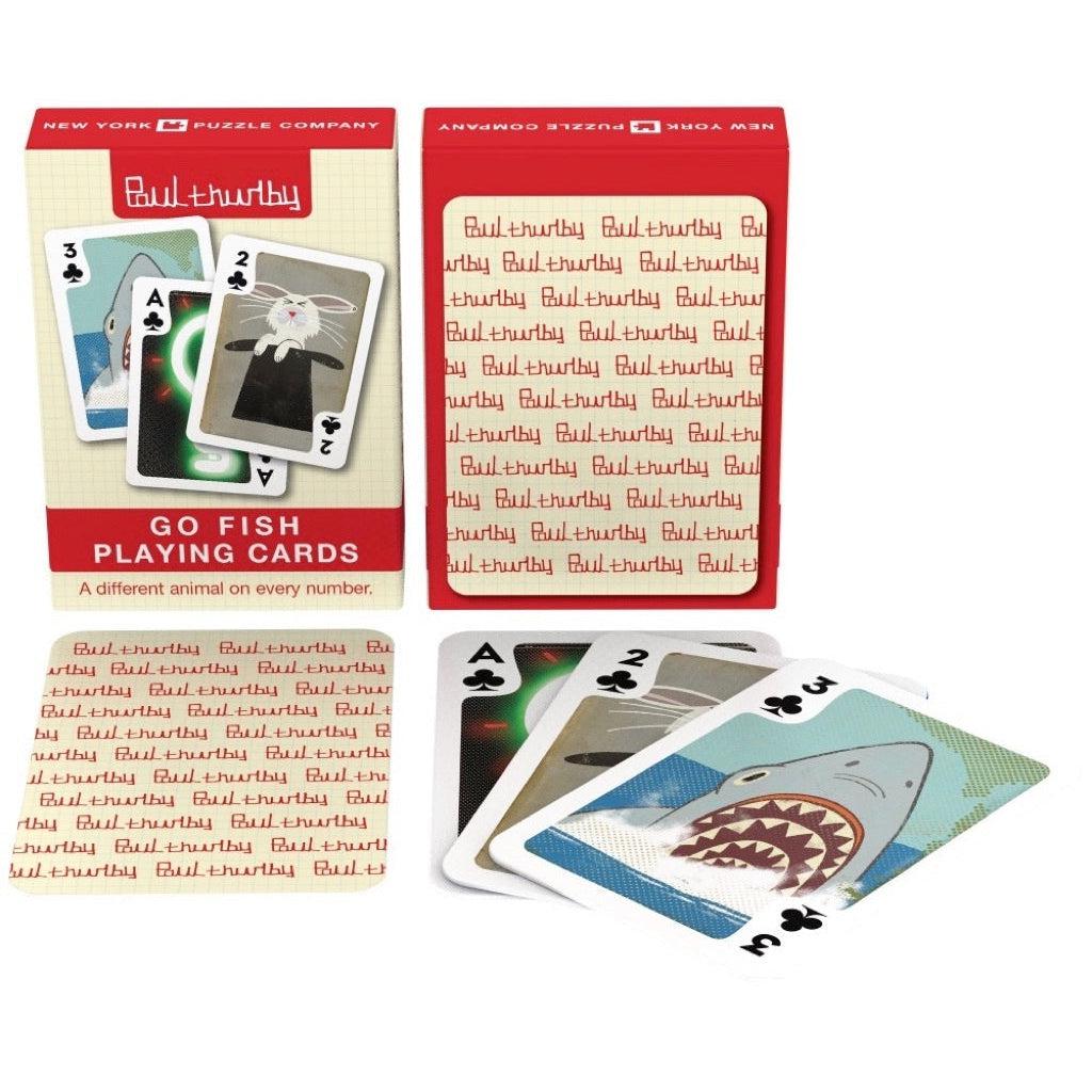 Image of the box, the back of the deck of cards, and the faces of three different example cards. Some examples of different featured animals include a shark and a rabbit.