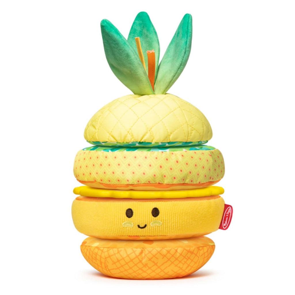 Toy out of package | Yellow pineapple shaped stacking toy with variety of patterns | Fabric covered rattling base with post | 2 plush rings, one soft and one with crinkle fabric | 1 hard plastic textured ring | Fabric topper with soft, crinkle leaves and satin ribbons