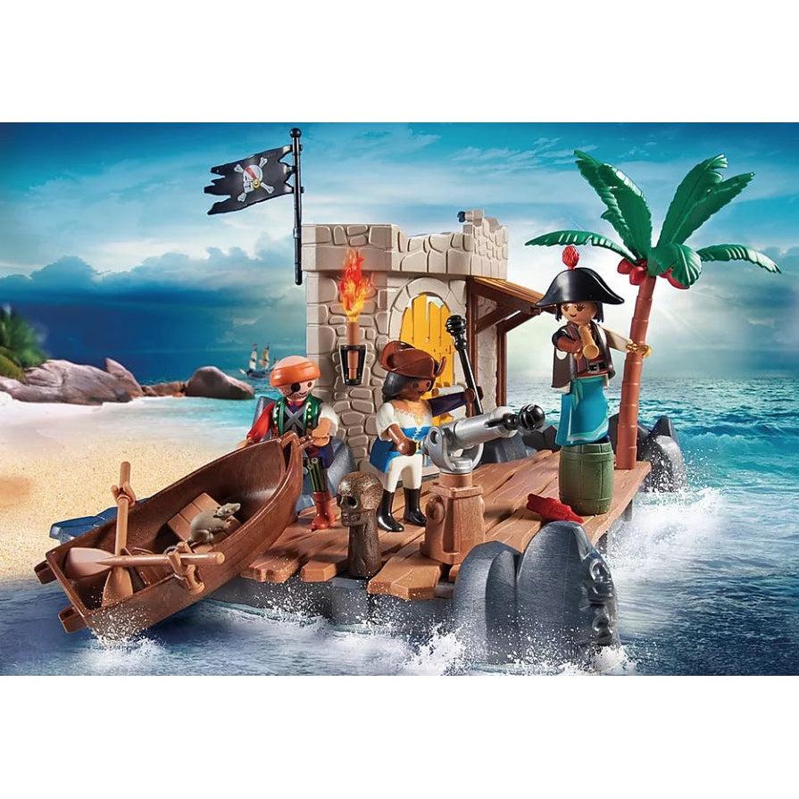 One playmobil figure drags a toy boat onto the playset dock while another mans a cannon, and a third stands on a barrel with a spyglass