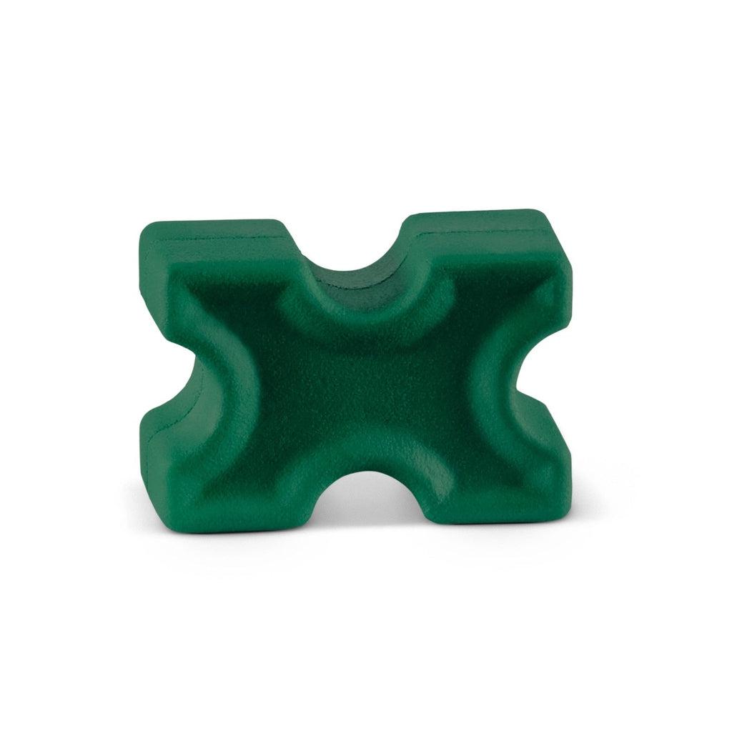Up close image of one of the green hurdle bar holders. It is in the shape of an X and it has places where the bar can rest for the horse to jump.