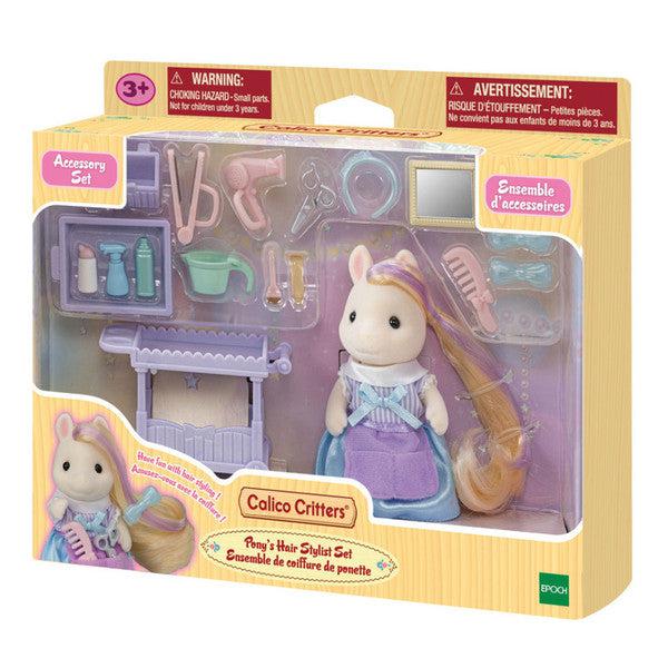 Image of the packaging for Calico Critters Pony's Hair Stylist set. The front is made of clear plastic so you can see the individual pieces included in the set.