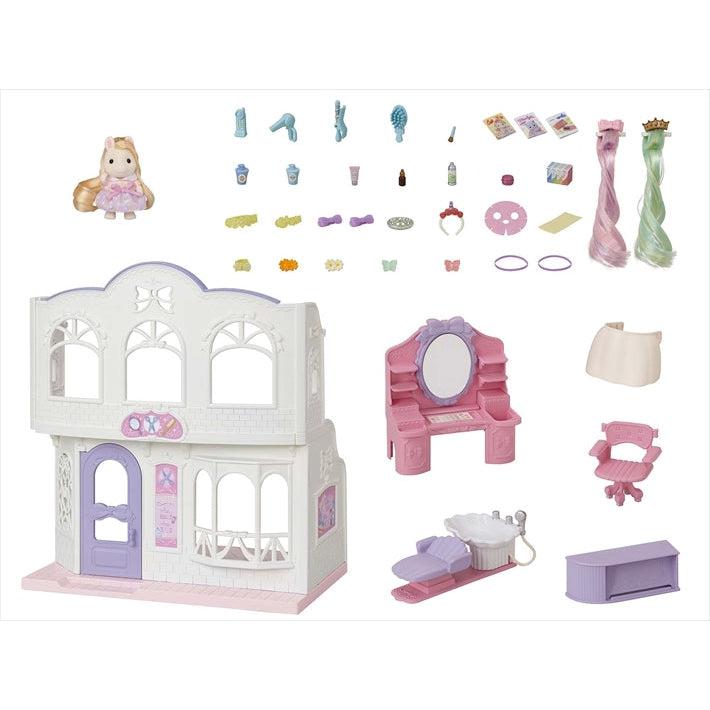 Image of all the individual parts included in the set. It includes a pony stylist doll, the salon, a front desk, a hair washing station, a mirror station with lots of shelves, a hair cutting chair, hair extensions, and various brushes clips and tools.
