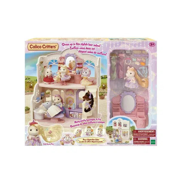 Image of the packaging for Calico Critters Pony's Stylish Hair Salon set. It has a big picture on the front of the box depicting many different critters getting their hair done at the salon. Part of the front is made from clear plastic so that you can see many of the included pieces.