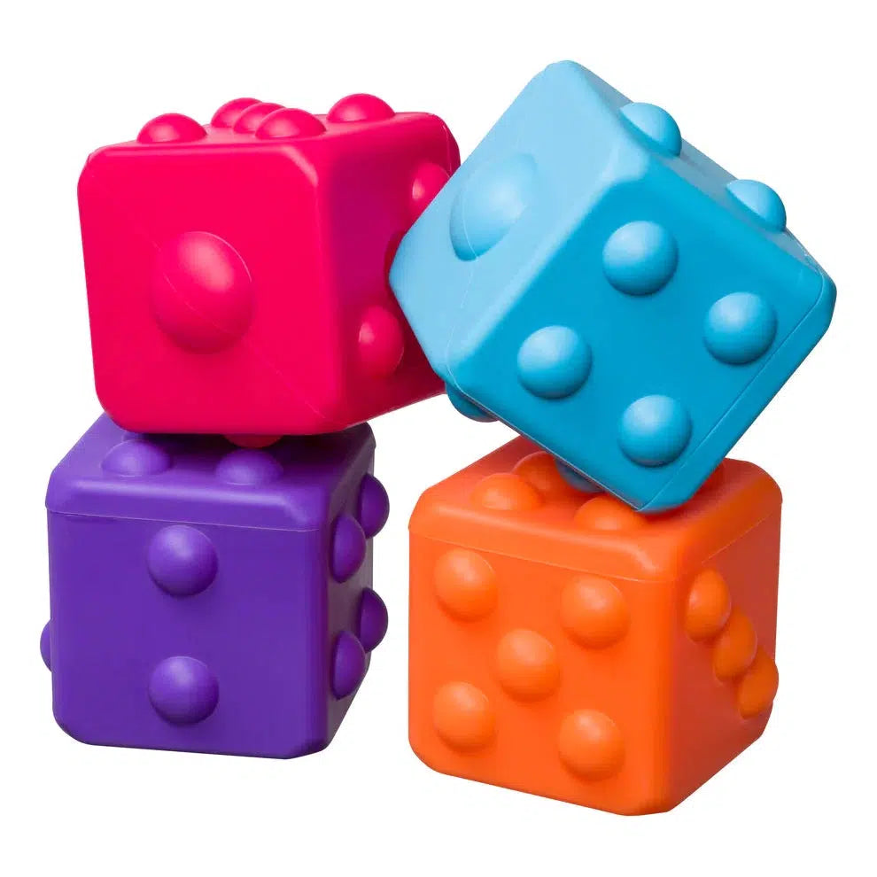 Image of four different Poppin Dice. The four colors they come in is dark pink, light blue, orange, and purple.