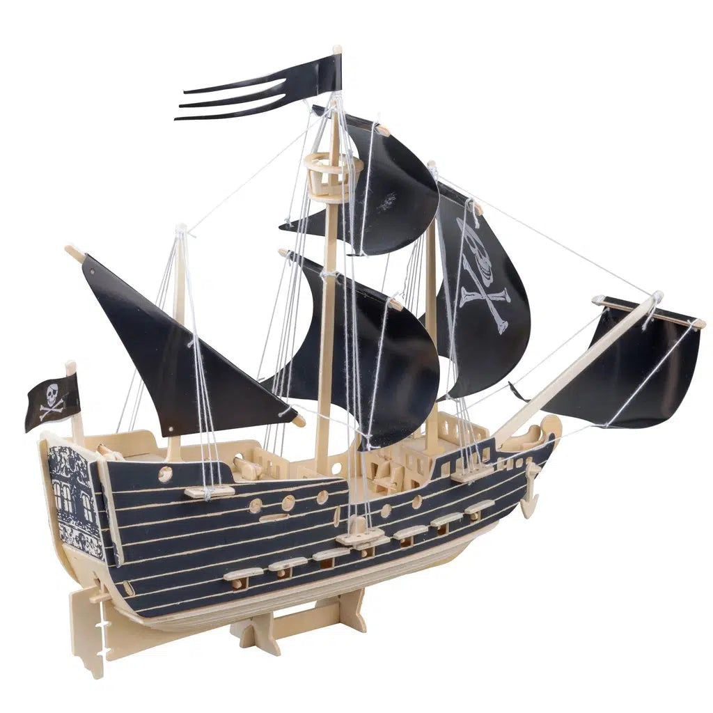 Back view of the model ship. You can see that behind the tallest sail is a lookout tower and there is a pirate's flag flying off the back of the ship.