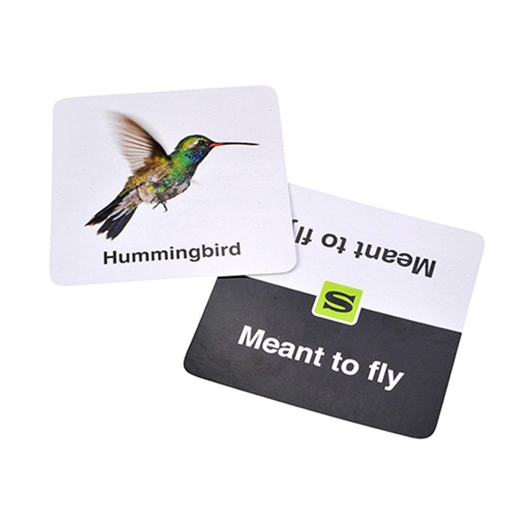this image shows two cards, one card has text reading "meant to fly" and on top of it is a card with a picture of a hummingbird. 