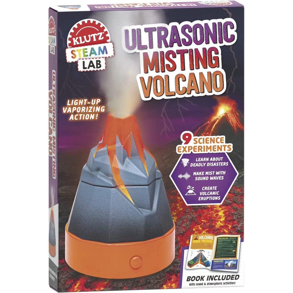 Toy in packaging | Front of box has an image of toy producing mist. Background is a realistic volcano at night with lighting. | Text on front "Light-up vaporizing action!" "9 Science Experiments"