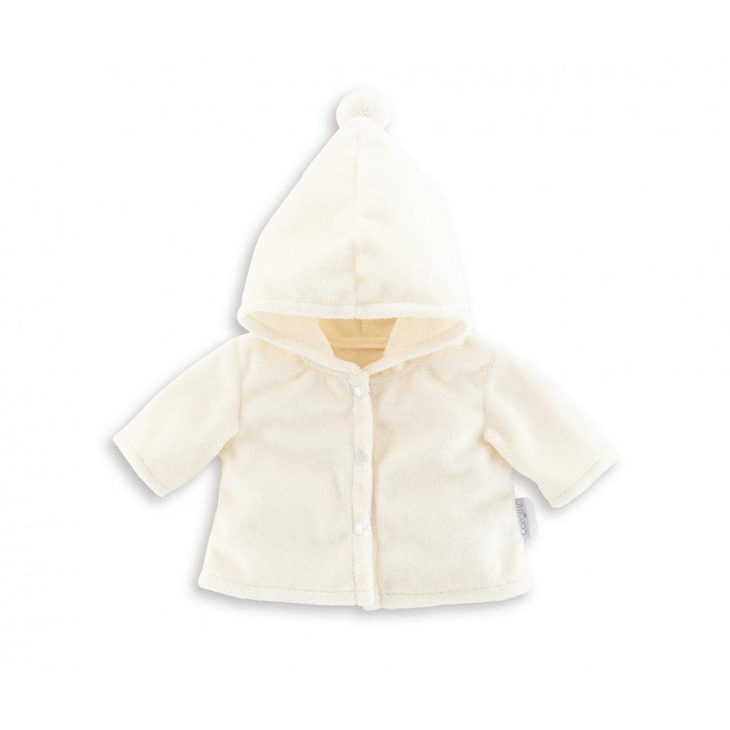 The jacket is a creamy white color with long sleaves and a hood that has a pom pom on the top of it.
